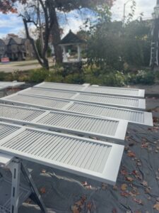 Residential painter in Jackson Michigan exterior shutter painting and finishing